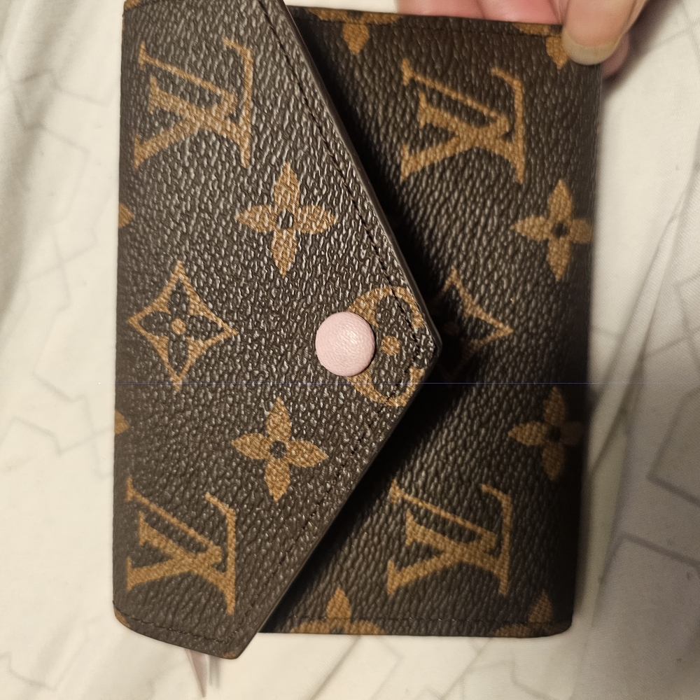 Louis Vuitton Monogram Wallet with Pink Button